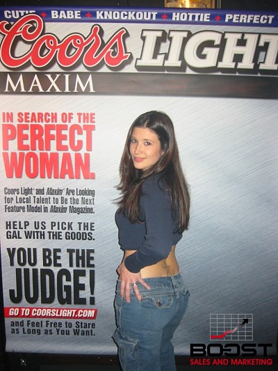 She has a fat ass and wants to become a promotional model for coors light beer.  she also is a Sexy Coors Light Maxim Girl Search - she is wearing a blue shirt and wants to get wild