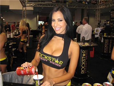 Rockstar Girl Pouring Energy Drink at Tradeshow