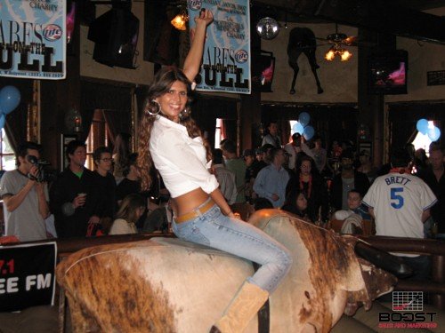 Sexy Brazilian Miller Lite Girl Riding Mechanical Bull