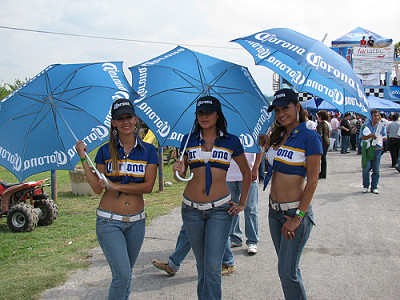 Sexy Corona Beer Girls with umbrellas wearing tight jeans wanting to become a promotional model for Boost Sales and Marketing,LlC